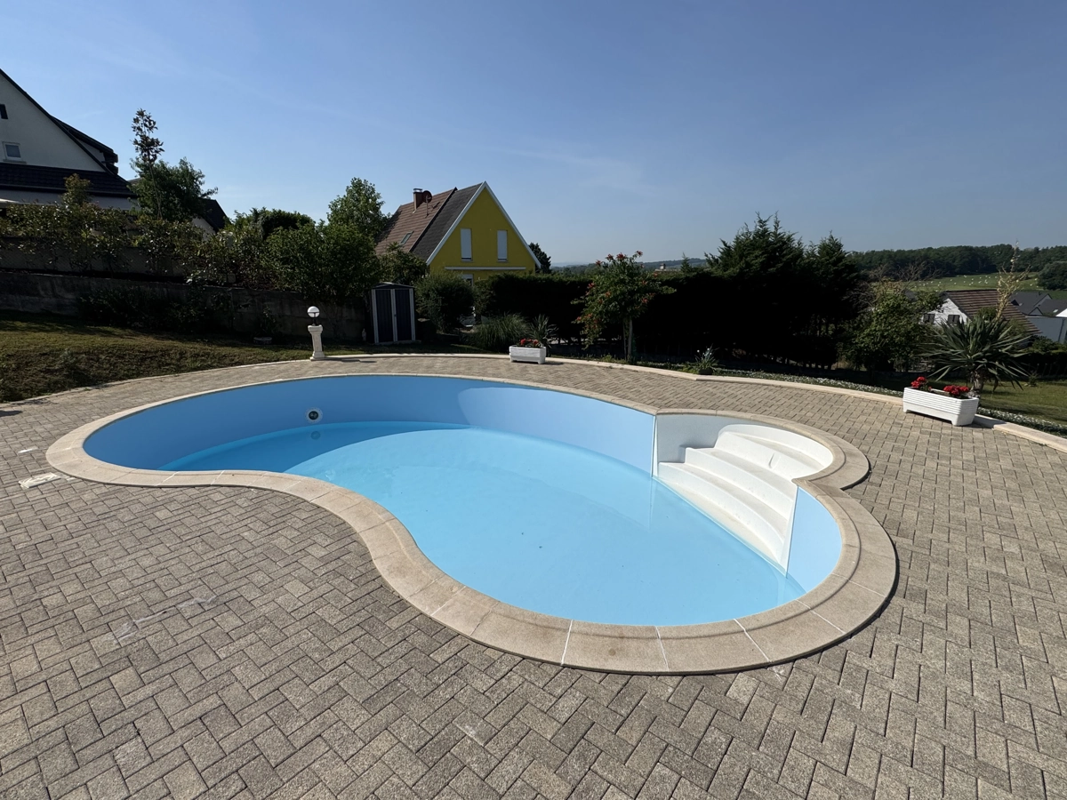Rénovation d'une piscine en kit Waterair en forme de haricot à Geispitzen en Alsace